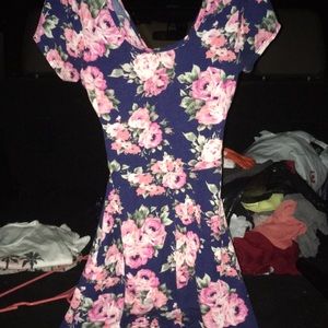 This is a floral dress with a back cut out